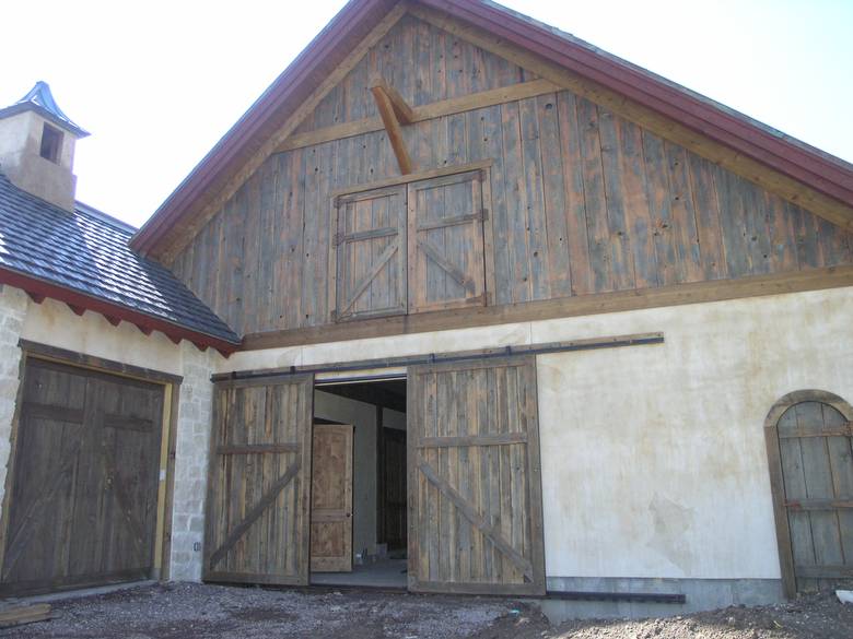Barn Doors and Siding / Coverboard barnwood was used for these barn doors and siding
